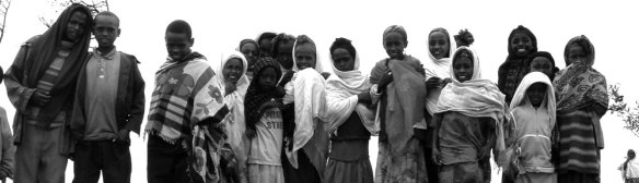 Children after attending church on top of the Demota Terrara, in the Wallaita-Sodo region of Ethiopia. We hiked up the mountain where the orthodox church sat, and I snapped this photo as everyone stared at me and appeared amused at my awkwardness. 